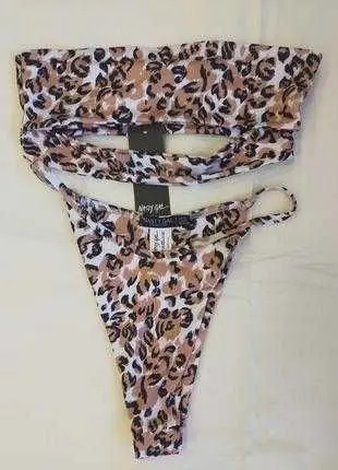Роздільний леопардовий купальник бренду
Nasty Gal